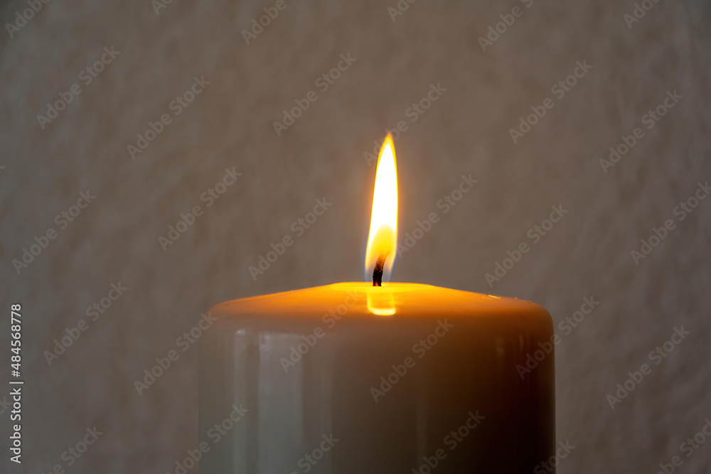a single burning candle a single burning candle
