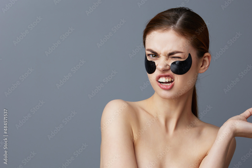 woman with patches on the face clean skin health rejuvenation close-up Lifestyle woman with patches on the face clean skin health rejuvenation close-up Lifestyle