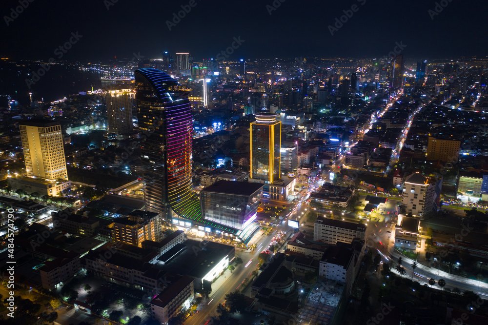 Top View of Building in a City - Aerial view Skyscrapers flying by drone of Phnom Penh city with downtown , riverside and sunset