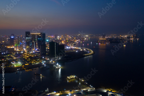 Top View of Building in a City - Aerial view Skyscrapers flying by drone of Phnom Penh city with downtown   riverside and sunset