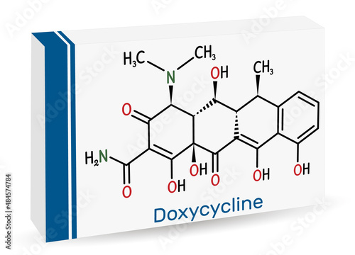 Doxycycline molecule. It is broad-spectrum tetracycline antibiotic used to treat a wide variety of bacterial infections. Skeletal chemical formula. Paper packaging for drugs