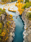 Aerial view of picturesque and tranquil place with a calm river in a rocky gorge during a colorful autumn. Majestic Indian summer in a nature park