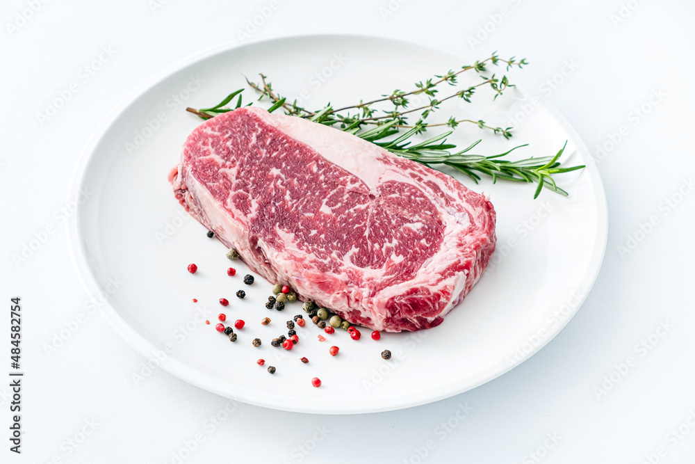 Close up beef rib eye steak isolated on white