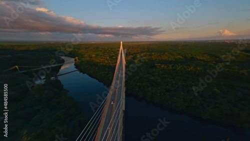 Aerial drone fpv over Mauricio Baez Bridge during golden hour, Dominican Republic photo