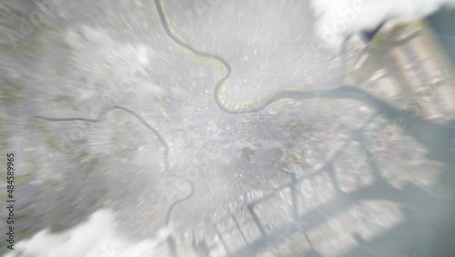 Earth zoom in from outer space to city. Zooming on Kawasaki, Japan. The animation continues by zoom out through clouds and atmosphere into space. View of the Earth at night. Images from NASA. 4K