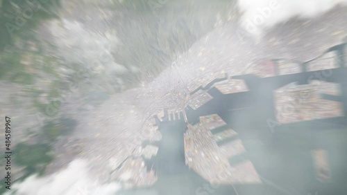 Earth zoom in from outer space to city. Zooming on Kobe, Japan. The animation continues by zoom out through clouds and atmosphere into space. View of the Earth at night. Images from NASA. 4K