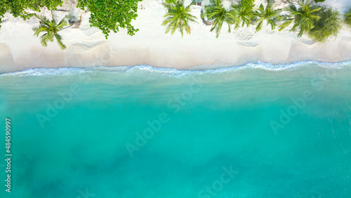 The tropical  summer white sand beach with a water wave background -Summer season image © SASITHORN