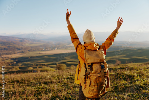 woman backpacking trip to mountains landscape Fresh air