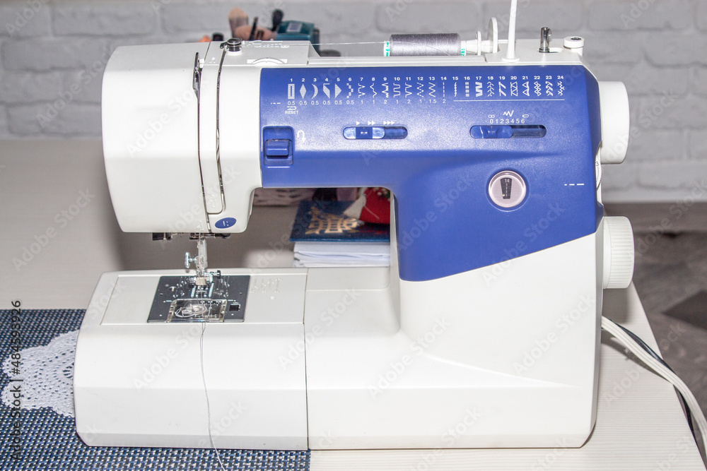 Overlock sewing machine. Making clothes, sewing. 