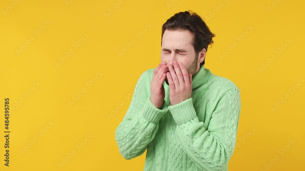 Sick ill young bearded man 20s wear mint shirt feel bad seedy