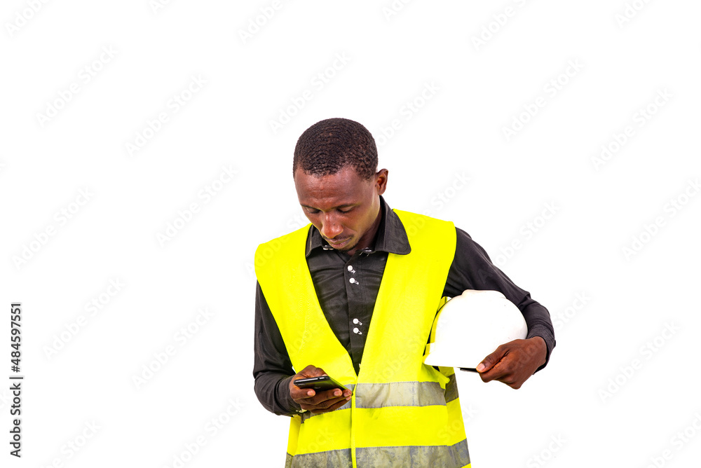 young man engineer using a mobile phone.