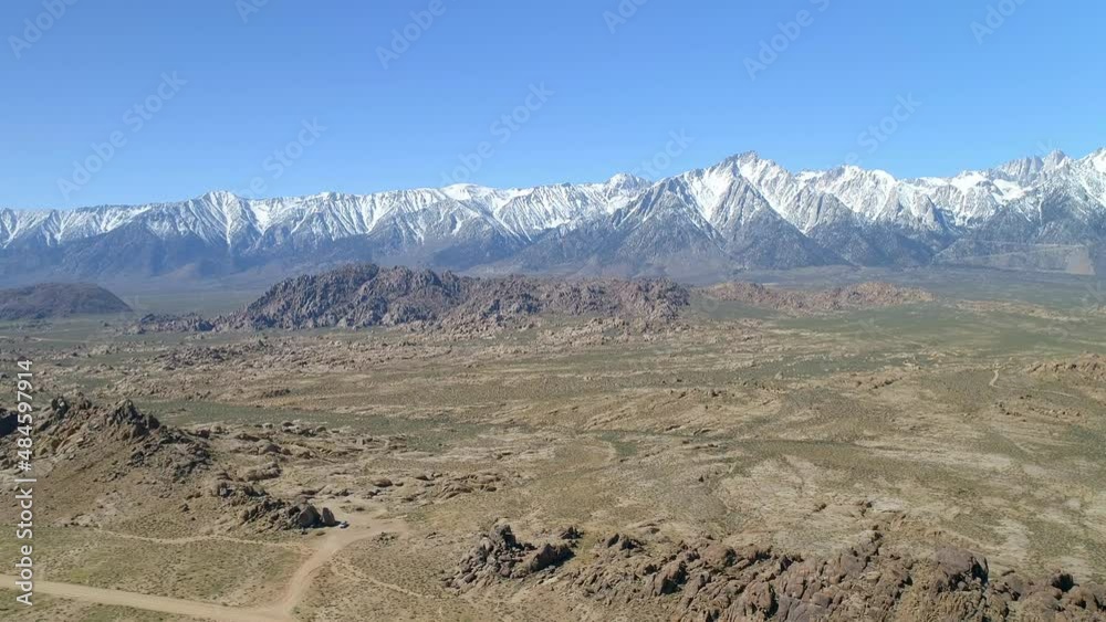 Aerial Beautiful View Of Glacier On Rock Formations Against Clear Sky - Bishop, California Aerial Beautiful View Of Glacier On Rock Formations Against Clear Sky - Bishop, California