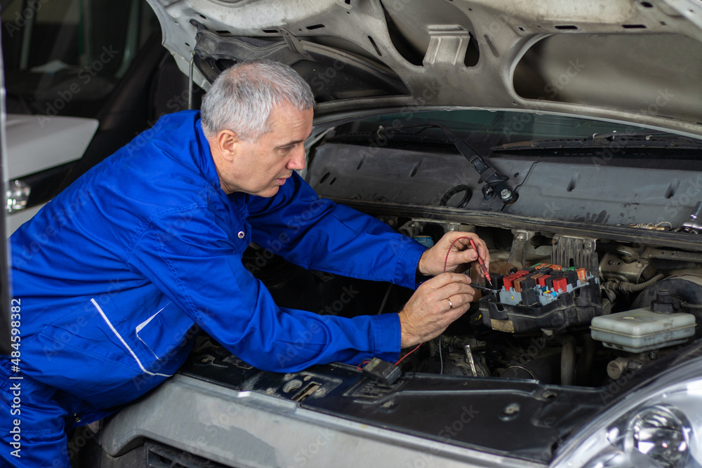 Specialist of service for repairing wiring and computer diagnostics car solve problem engine malfunction Specialist of service for repairing wiring and computer diagnostics car solve problem engine malfunction