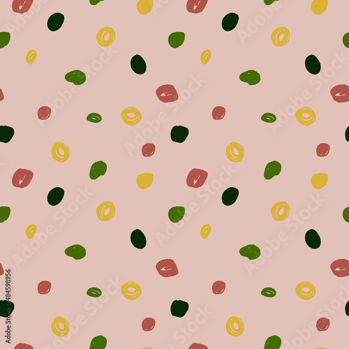 Vector seamless pattern of spots on a pink background. Multi-colored spots are hand-drawn.