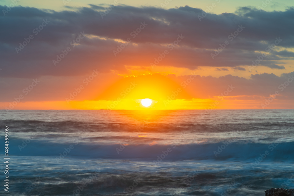 Fototapeta premium Soft sunrise seascape with clouds
