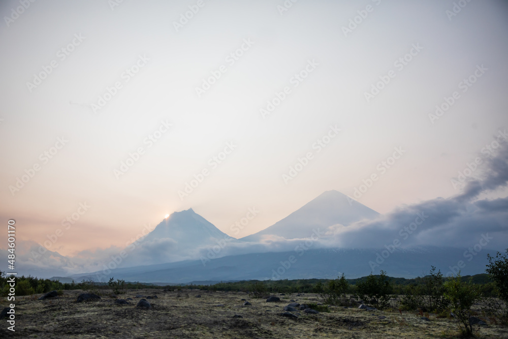 The active Kamchatka Volcano Klyuchevskaya Sopka at dawn