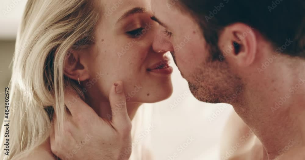 So much chemistry in that kiss. Sexy young couple kissing and being intimate at home. Passionate man and woman having sexy moment in bed, enjoying foreplay and romance before making love So much chemistry in that kiss. Sexy young couple kissing and being intimate at home. Passionate man and woman having sexy moment in bed, enjoying foreplay and romance before making love