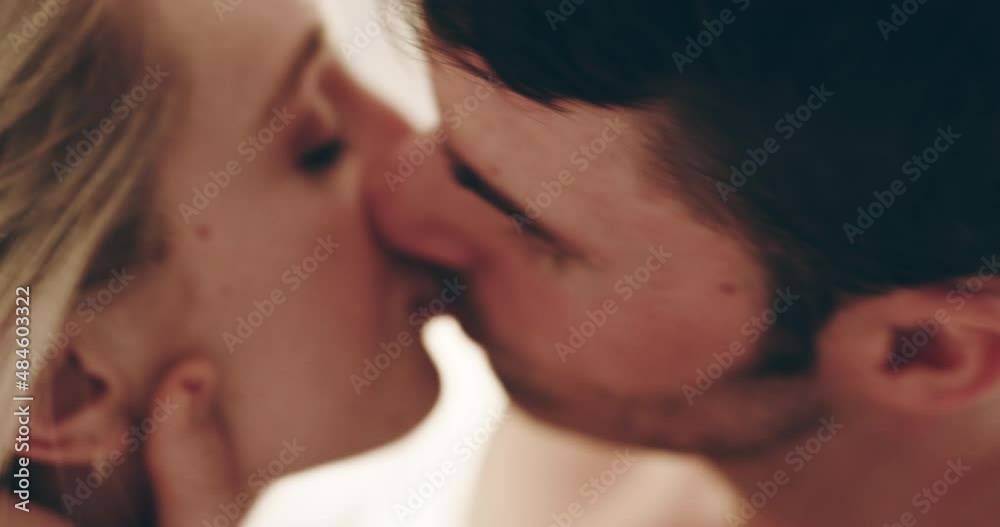 I cant get enough of your lips. Sexy young couple kissing and being intimate at home. Passionate man and woman having sexy moment in bed, enjoying foreplay and romance before making love I cant get enough of your lips. Sexy young couple kissing and being intimate at home. Passionate man and woman having sexy moment in bed, enjoying foreplay and romance before making love
