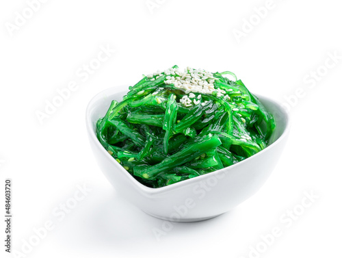 Green chuka seaweed salad isolated on white