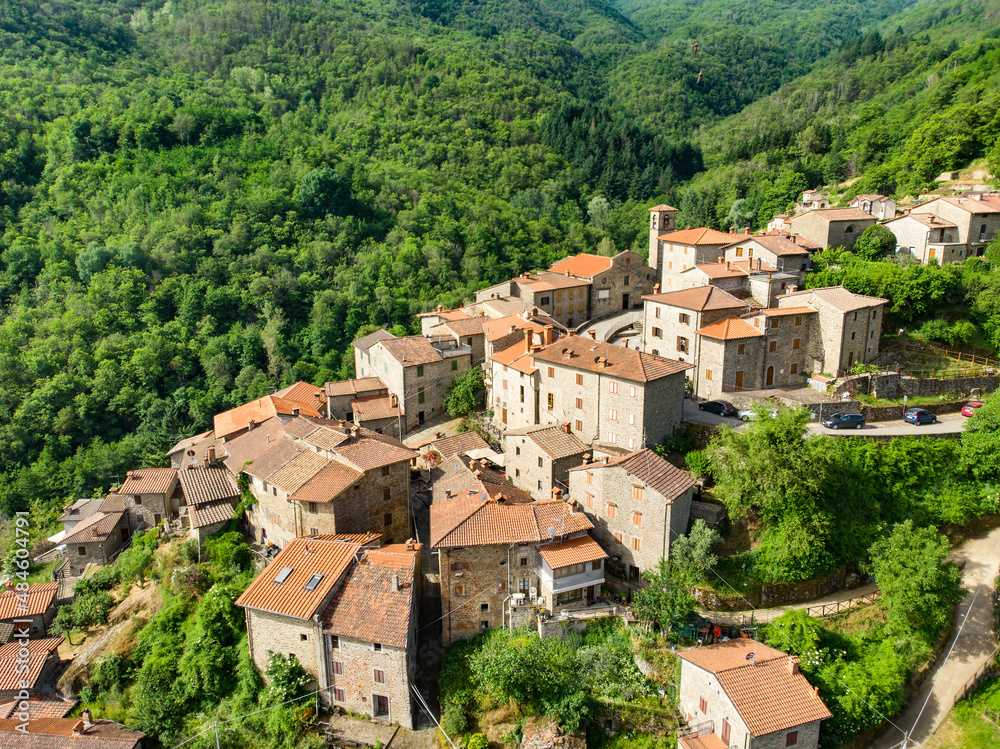 Aerial view of beautiful Raggiolo village, located on the eastern slopes of Pratomagno, surrounded by chestnut forests.
