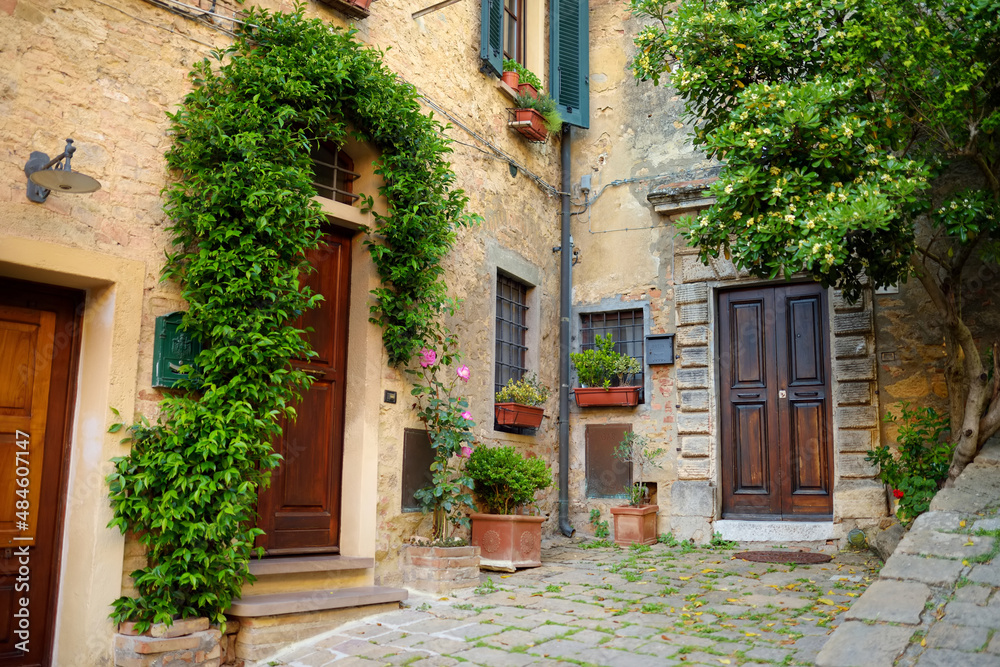 Charming old streets of Volterra, known fot its rich Etruscan heritage, located on a hill overlooking the picturesque landscape. Tuscany, Italy.