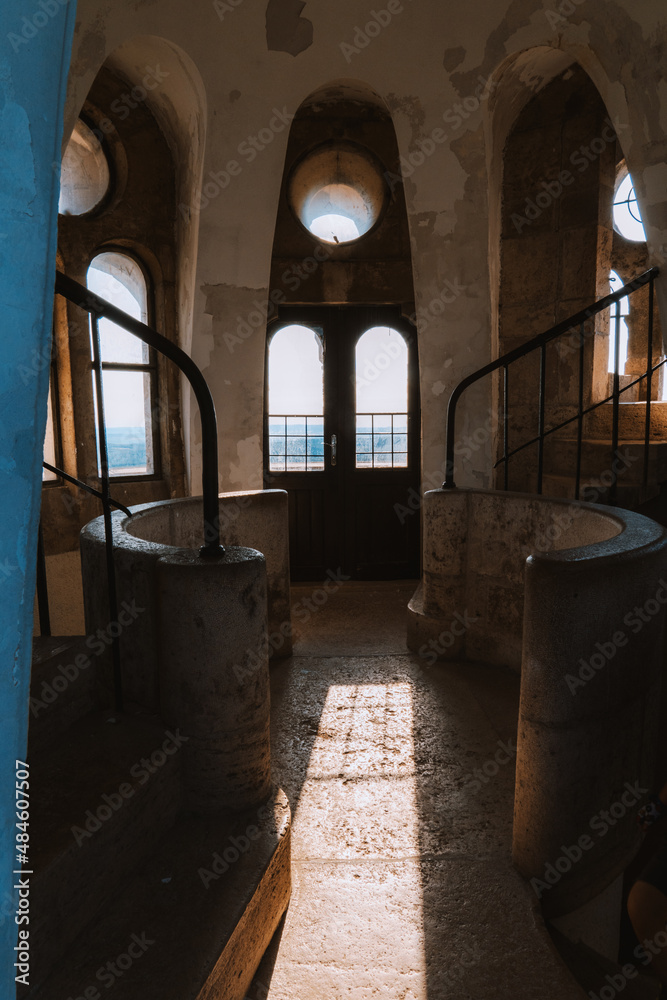 Fototapeta premium Beautiful sunlight shining through the windows of a tower