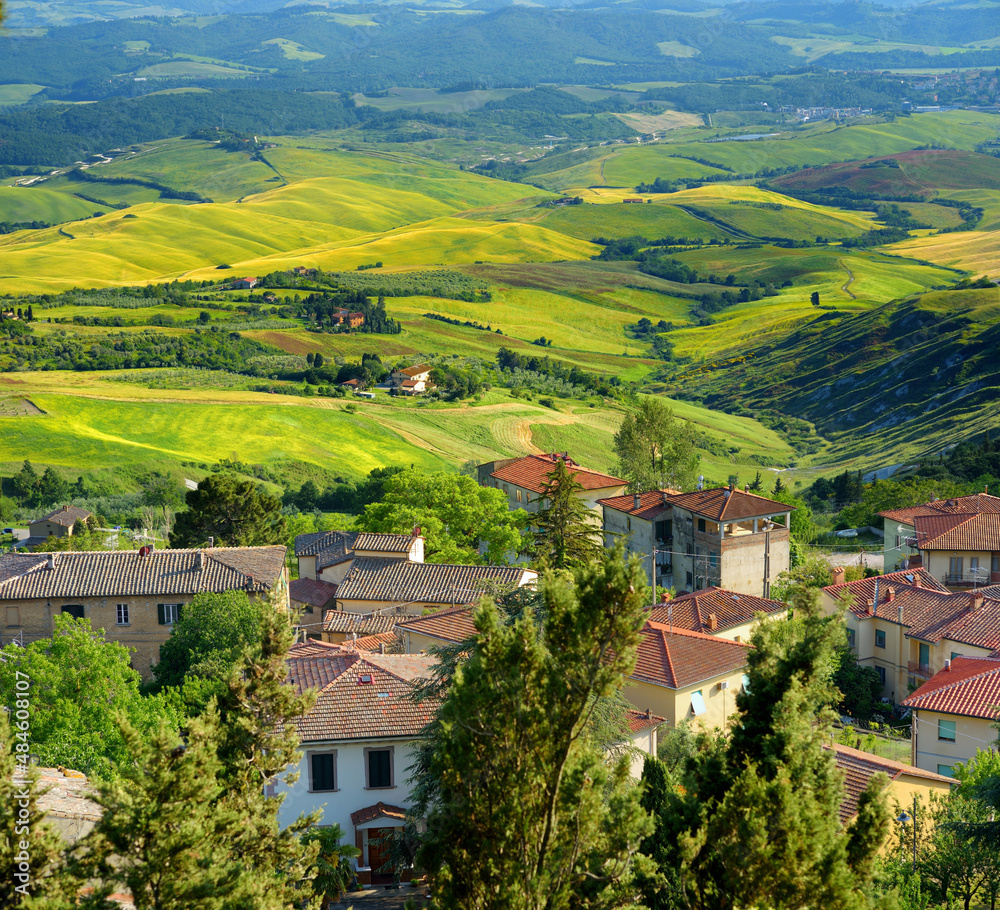 Stunning surroundings of medieval town of Volterra, known fot its rich Etruscan heritage, located on a hill overlooking the picturesque landscape. Tuscany, Italy.