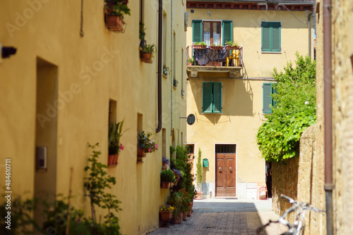 Narrow street of Pienza  a village located in the beautiful Tuscany valley  known as the  ideal city of the Renaissance  and a  capital  of pecorino cheese. UNESCO World Heritage Site.