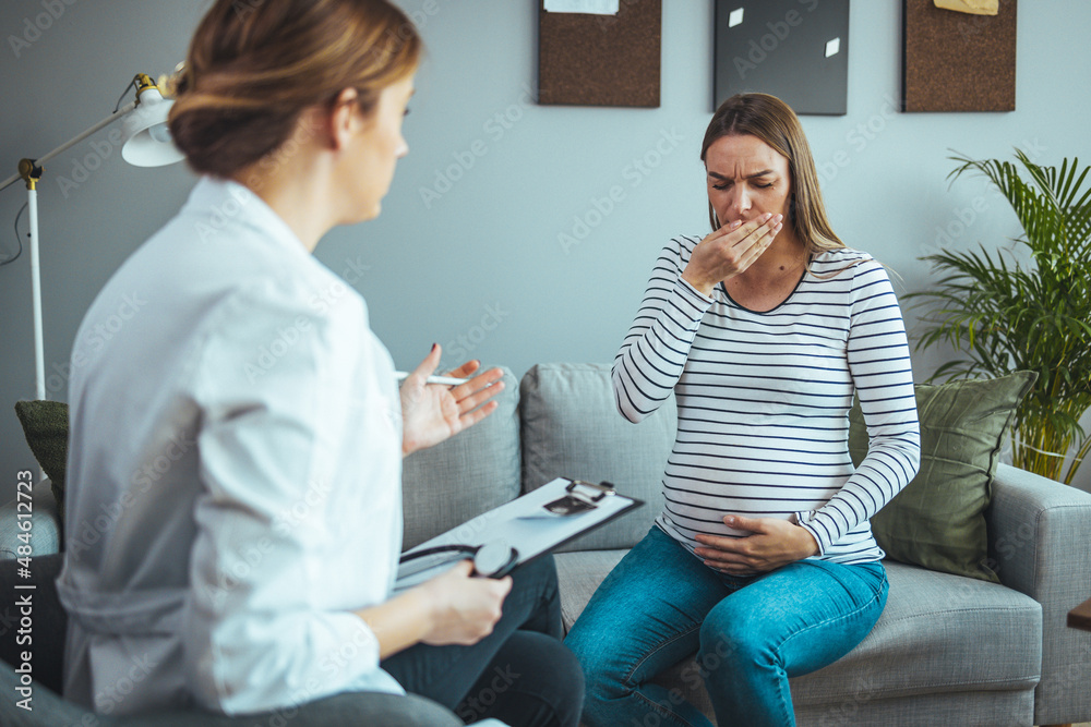 Young pregnant woman talking with doctor. Pregnant Woman Coughing
