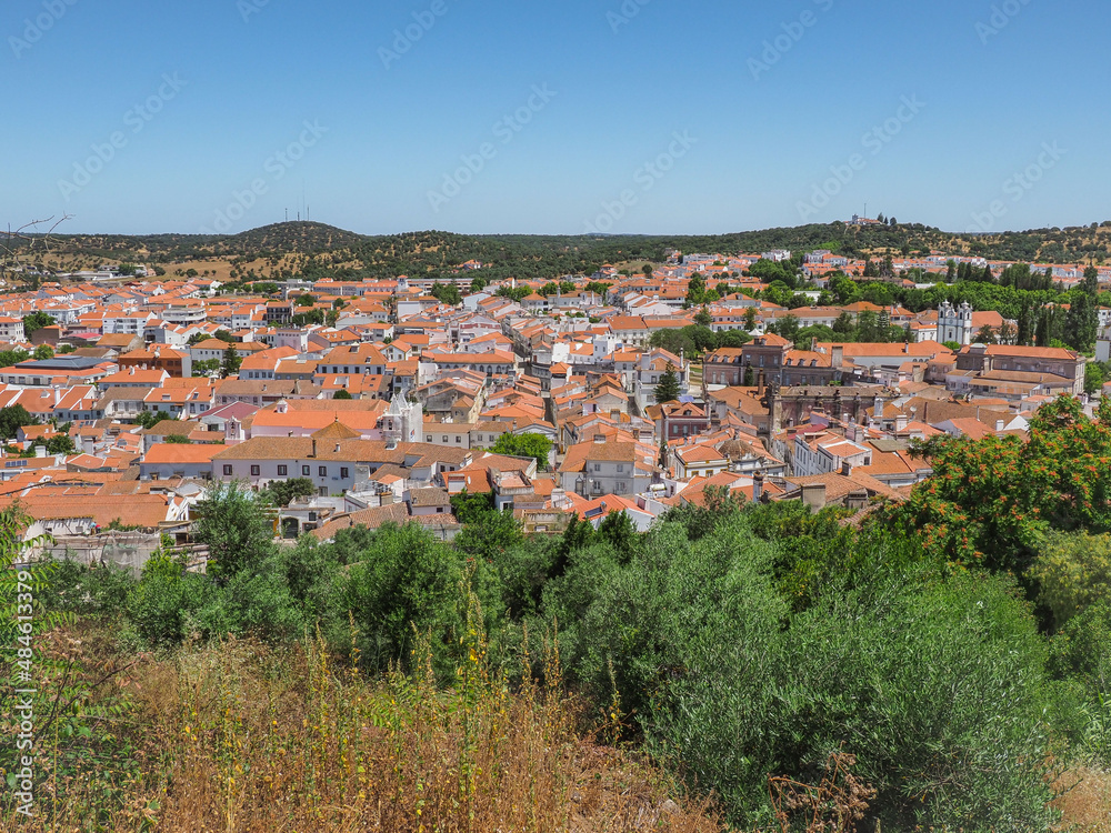 Panoramic view of Montemor-o-Novo city. Traditional Portuguese town in the Évora District. Streets, squares, churches, ruins of castle are popular tourist destination.