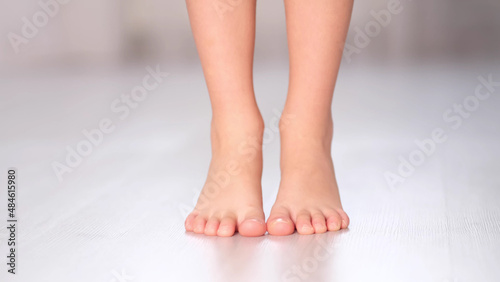 child rolls from heel to toe. Prevention of flat feet in children. Exercises for the legs. Flat feet physical therapy. close up