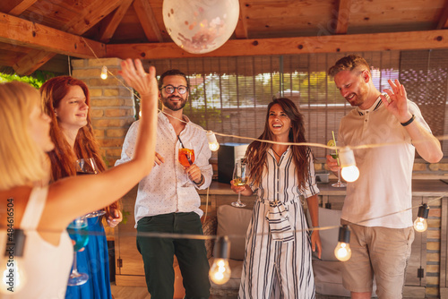 Group of people having fun at birthday party