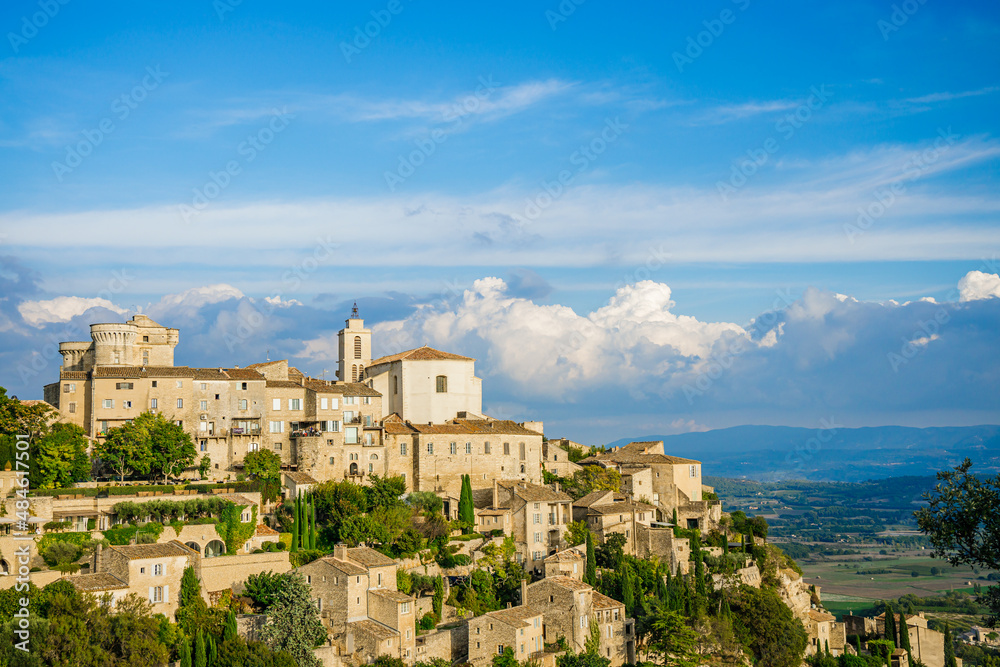 Castle and Saint-Firmin church of Gordes, a medieval village in the Luberon valley in France perched on a hilltop