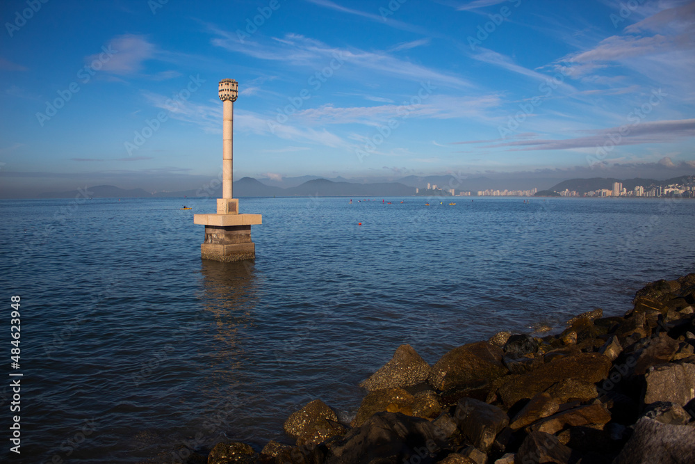 Fototapeta premium Monument for Dom Henrique at Santos sea, with a beatiful view of santos in background. Santos - São Paulo 02-02-2022