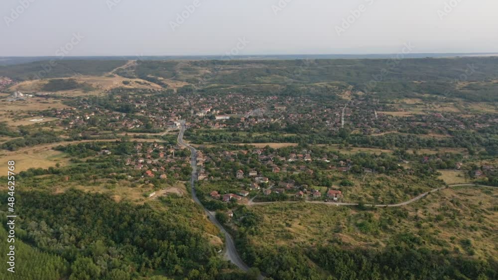 Drone zoom in view of small city Drone zoom in view of small city