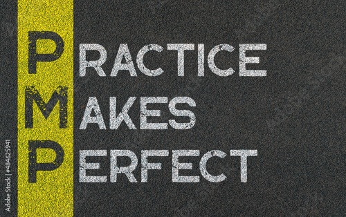 Practice makes perfect (PMP) on yellow painted line of road background photo