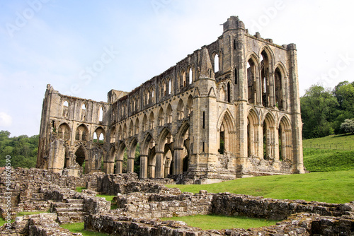 The spectacular ruins of Rievaulx Abbey in Yorkshire, for centuries the home of Cistercian monks until it was seized and destroyed by King Henry VIII in 1538. photo