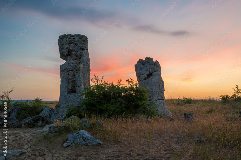 Beautyful sunrise over The Stone Desert Pobiti Kamani - fabulous rock phenomenon in Varna Province, Bulgaria - tourist destination