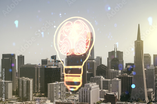 Double exposure of abstract virtual creative light bulb hologram with human brain on San Francisco city skyscrapers background, idea and brainstorming concept