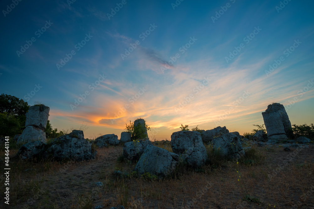 Beautyful sunrise over The Stone Desert Pobiti Kamani - fabulous rock phenomenon in Varna Province, Bulgaria - tourist destination