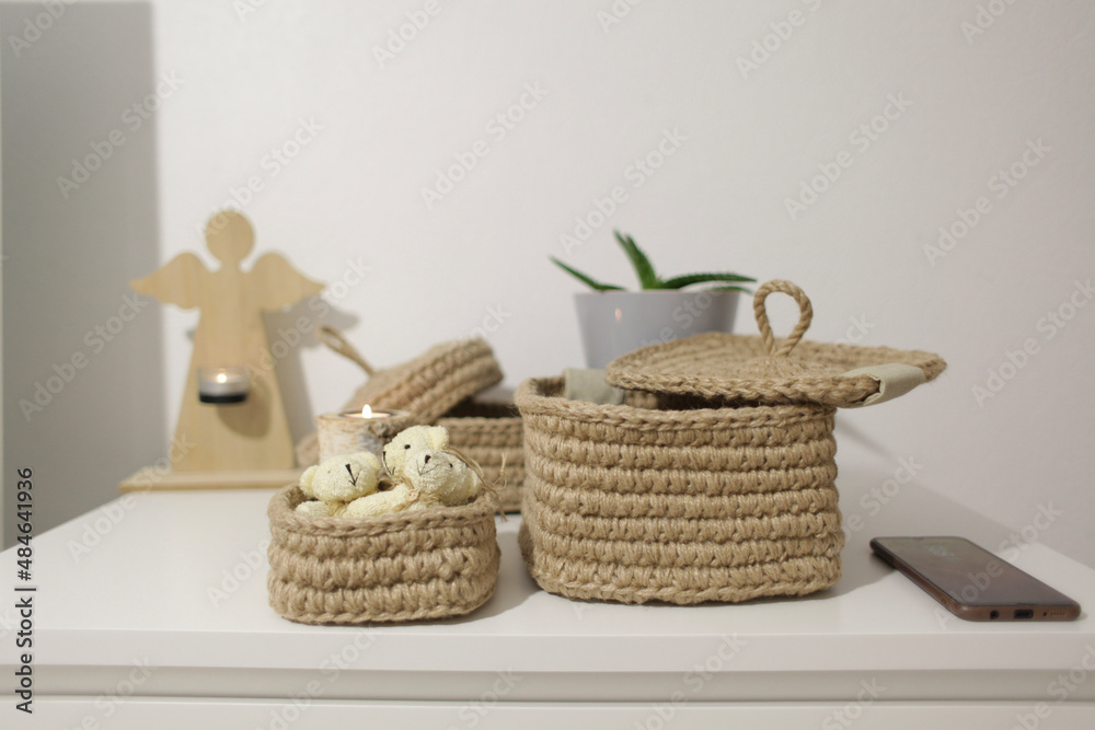 Fototapeta premium person holding a basket with flowers
