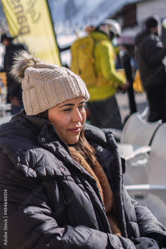 woman sitting on the street in winter