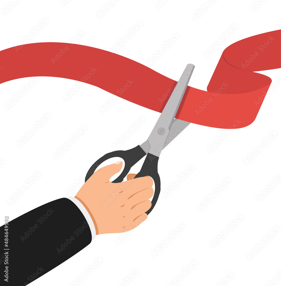 Businessman hand with scissors cut red ribbon Businessman hand with scissors cut red ribbon
