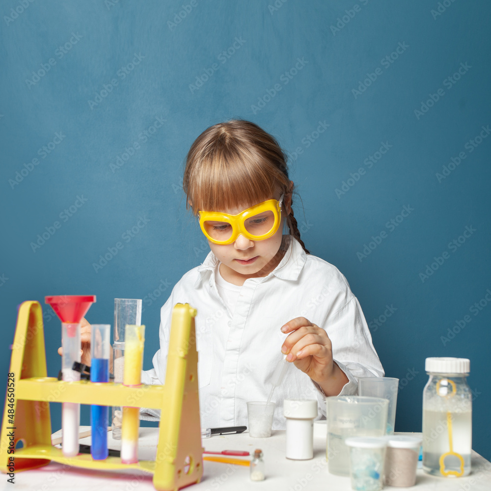 Smart kid at elementary school, science and education concept