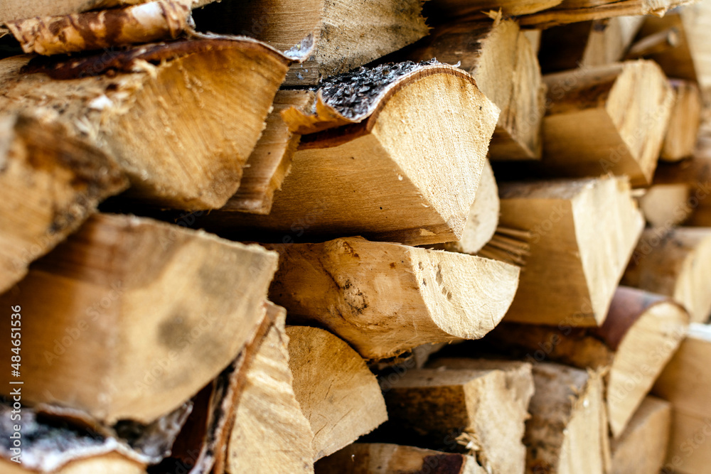 Natural wooden dry logs close up with bokeh Natural wooden dry logs close up with bokeh