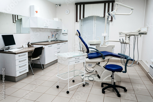 Light empty dental office with medical equipment