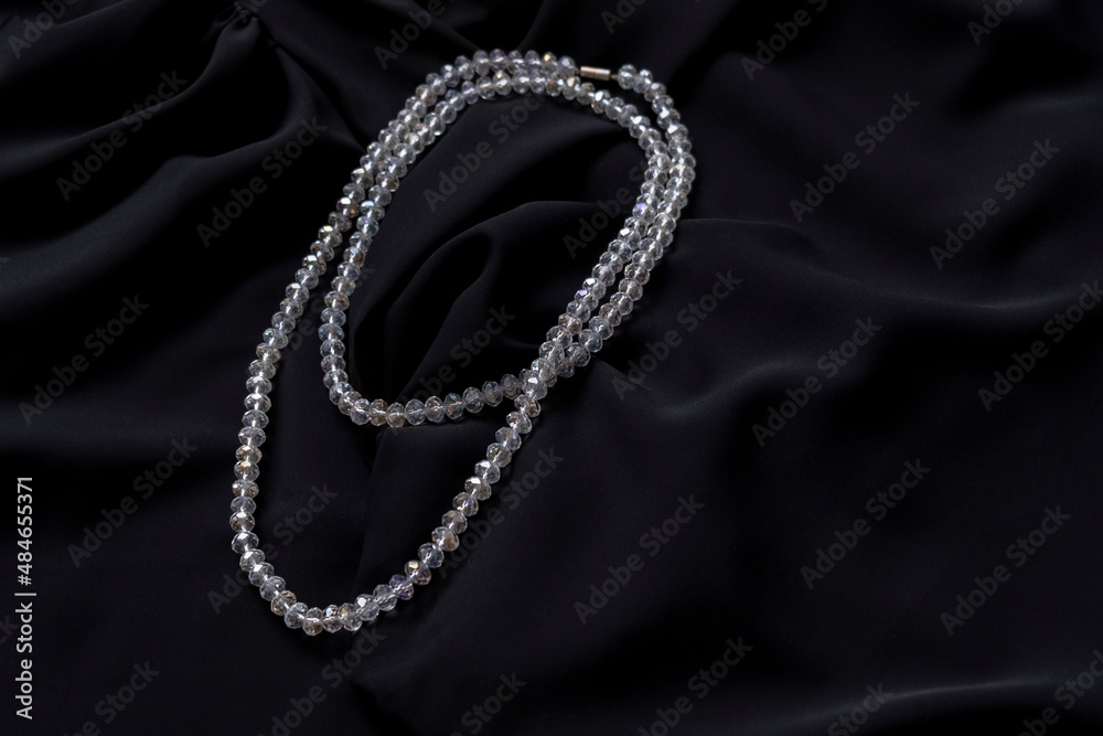 Crystal necklace on black silk. Jewerely store.