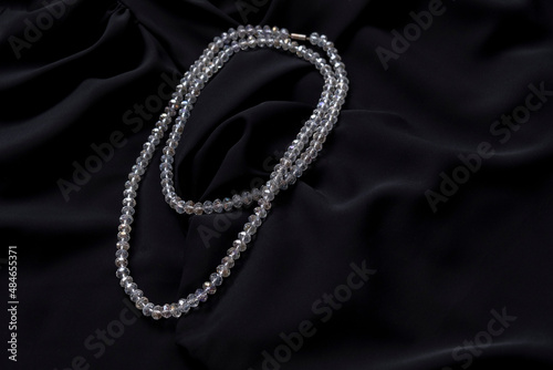 Crystal necklace on black silk. Jewerely store.