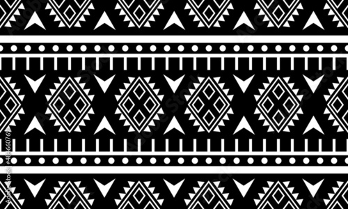 abstract geometric Ethnic Pattern fabric white black for background or wallpaper.	