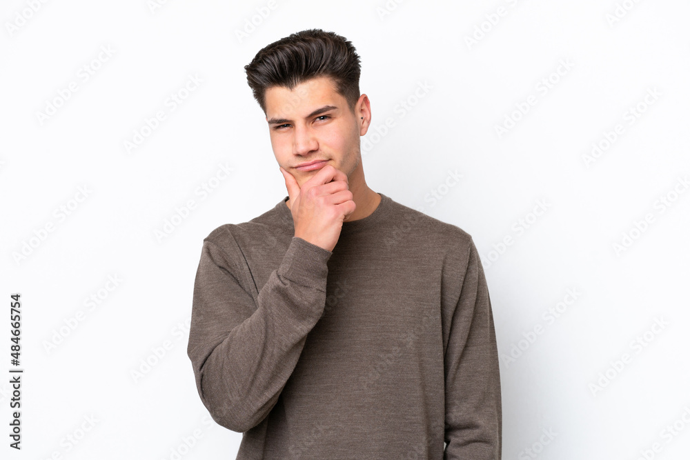 Young handsome caucasian man isolated on white bakcground thinking Young handsome caucasian man isolated on white bakcground thinking